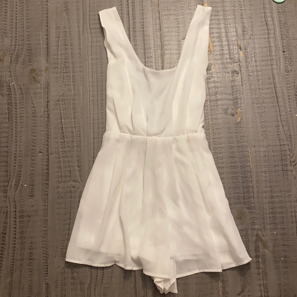 White romper with bow in back